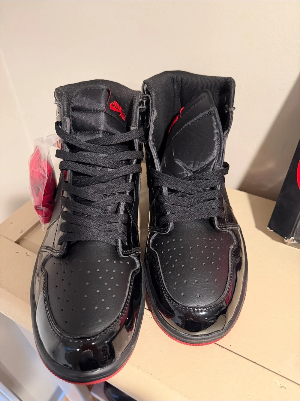 Nike Black Patent Leather High-Top Sneakers with Red Outsole and Laces